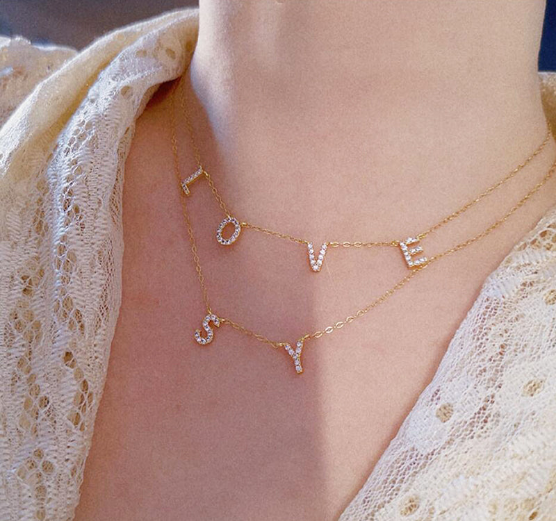Spaced initial necklace store
